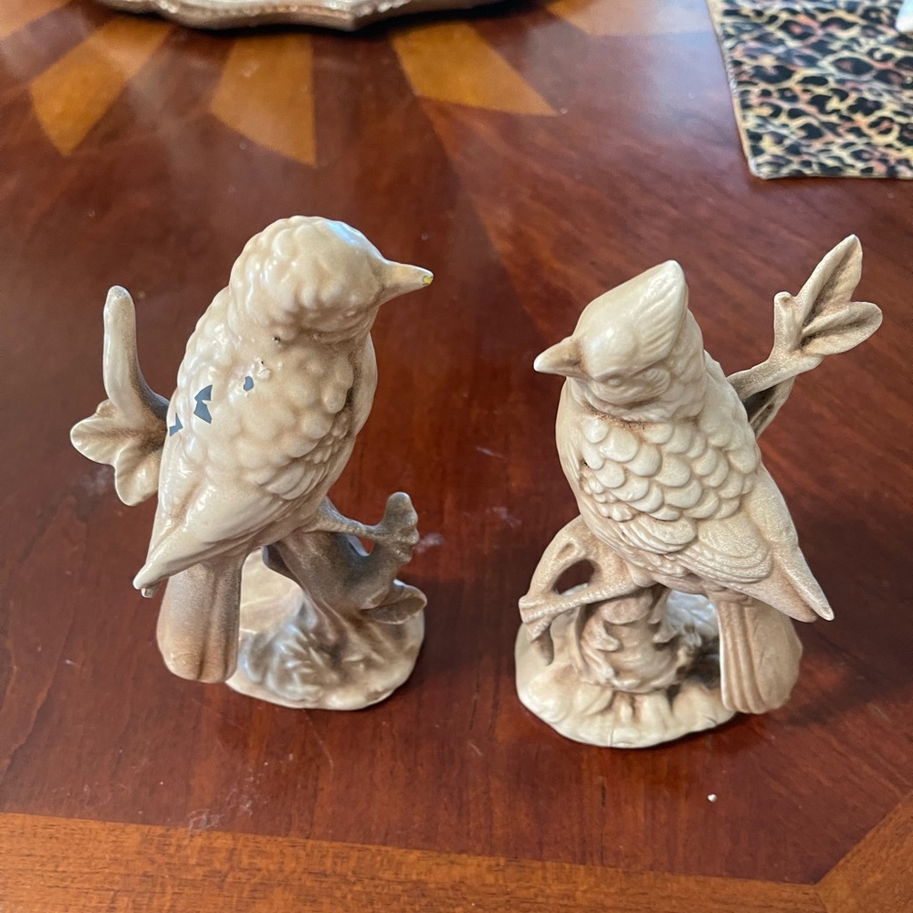 Two bird figurines